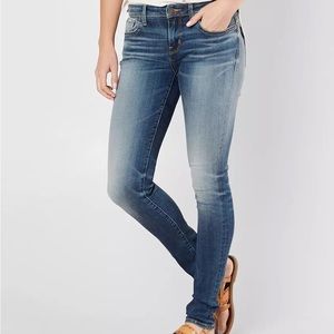 Buckle Black Skinny Jeans SZ 27x32